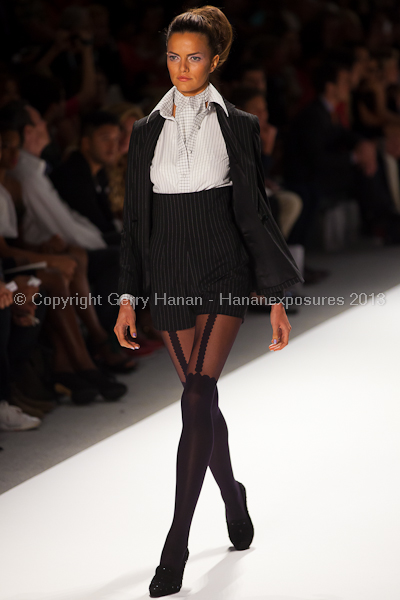 A model on the runway at the Zang Toi SS2013 show at New York Mercedes-Benz Fashion Week.