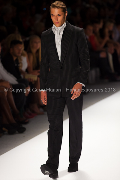 A model on the runway at the Zang Toi SS2013 show at New York Mercedes-Benz Fashion Week.