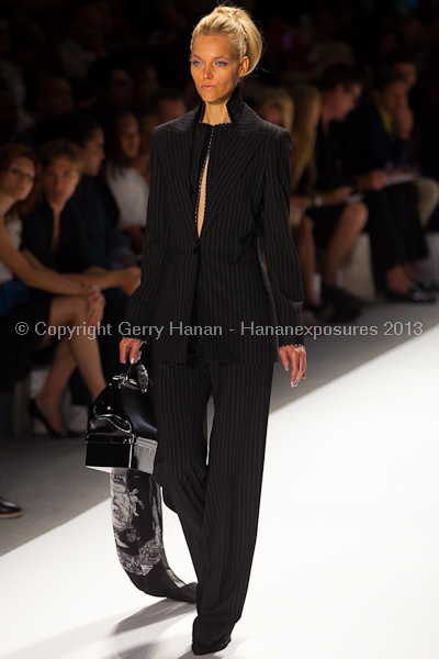 A model on the runway at the Zang Toi SS2013 show at New York Mercedes-Benz Fashion Week.