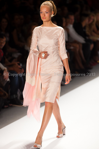 A model on the runway at the Zang Toi SS2013 show at New York Mercedes-Benz Fashion Week.