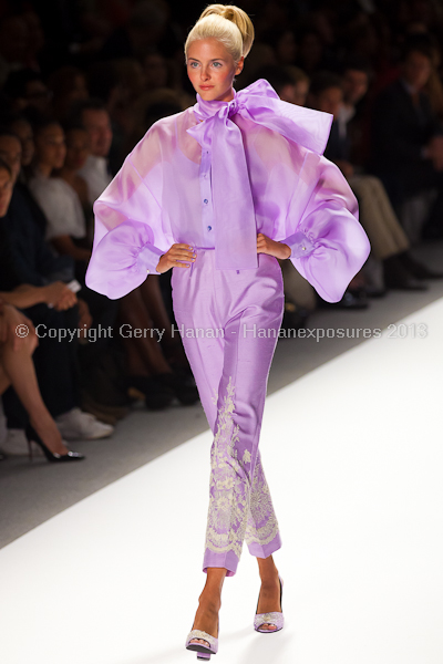 A model on the runway at the Zang Toi SS2013 show at New York Mercedes-Benz Fashion Week.