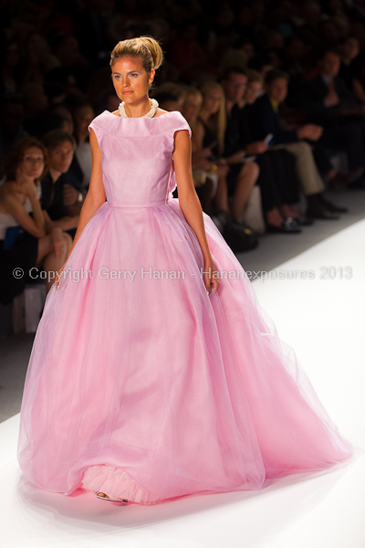 A model on the runway at the Zang Toi SS2013 show at New York Mercedes-Benz Fashion Week.