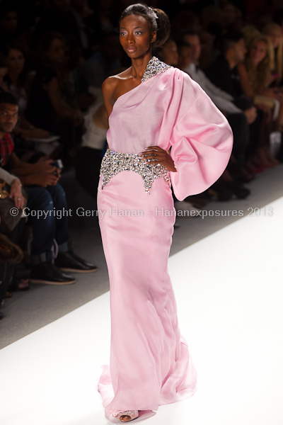 A model on the runway at the Zang Toi SS2013 show at New York Mercedes-Benz Fashion Week.