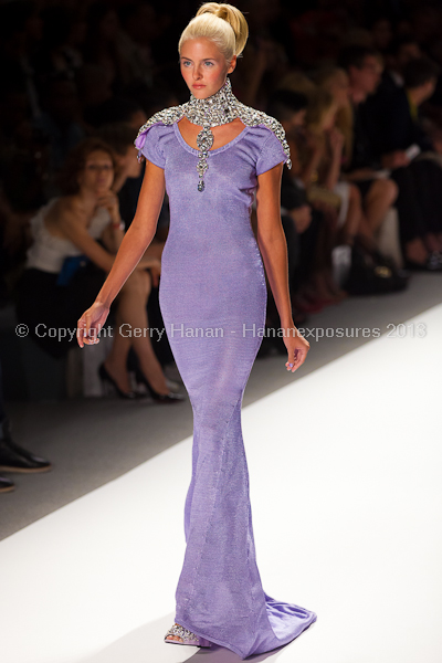 A model on the runway at the Zang Toi SS2013 show at New York Mercedes-Benz Fashion Week.