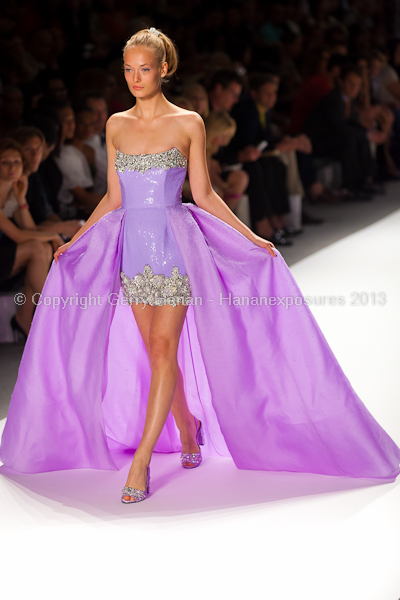 A model on the runway at the Zang Toi SS2013 show at New York Mercedes-Benz Fashion Week.