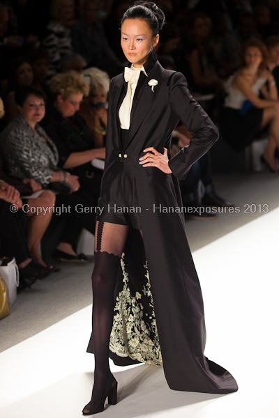 A model on the runway at the Zang Toi SS2013 show at New York Mercedes-Benz Fashion Week.