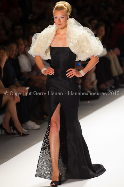 A model on the runway at the Zang Toi SS2013 show at New York Mercedes-Benz Fashion Week.