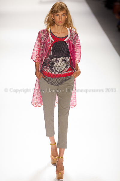 A model on the runway at the Custo Barcelona SS2013 show at New York Mercedes-Benz Fashion Week.