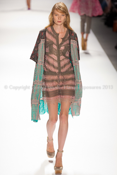 A model on the runway at the Custo Barcelona SS2013 show at New York Mercedes-Benz Fashion Week.