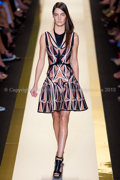 A model on the runway at the Herve Leger SS2013 show at New York Mercedes-Benz Fashion Week.