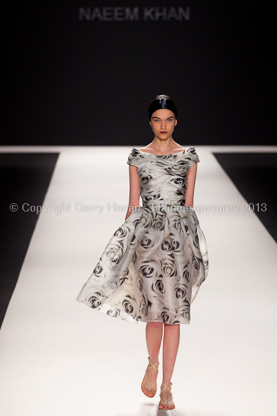 A model on the runway at the Naeem Khan SS2013 show at New York Mercedes-Benz Fashion Week.