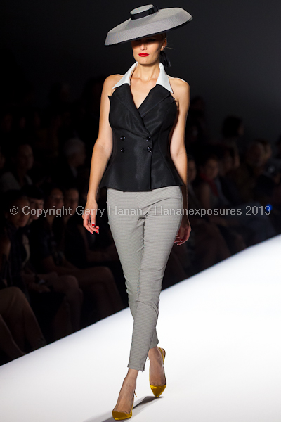 A model on the runway at the Norisol Ferrari SS2013 show at New York Mercedes-Benz Fashion Week.