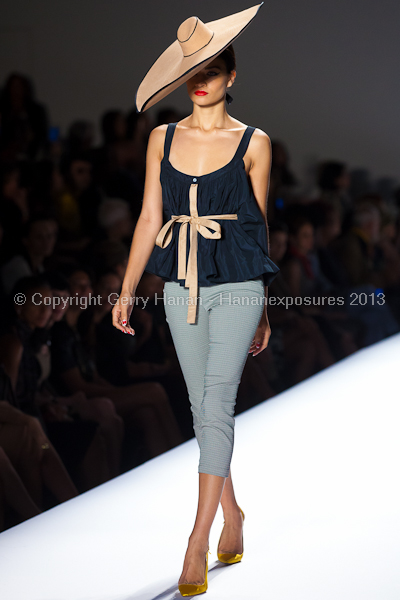 A model on the runway at the Norisol Ferrari SS2013 show at New York Mercedes-Benz Fashion Week.