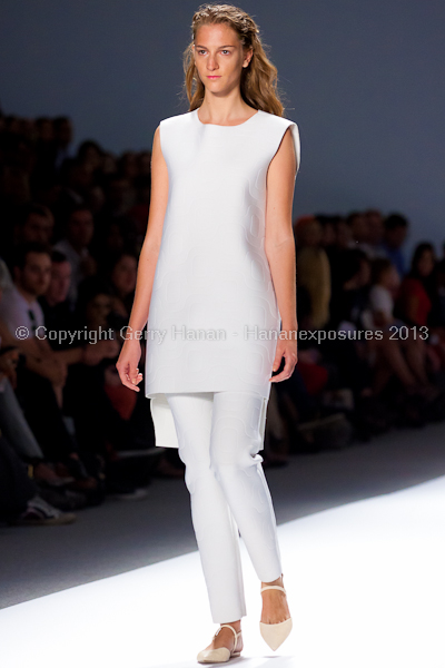 A model on the runway at the Osklen SS2013 show at New York Mercedes-Benz Fashion Week.