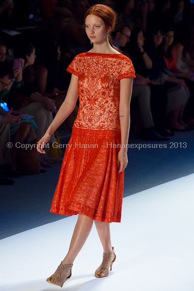 A model on the Tadashi Shoji SS2013 runway show during New York Mercedes-Benz Fashion Week.