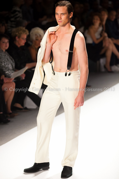 A model on the runway at the Zang Toi SS2013 show at New York Mercedes-Benz Fashion Week.