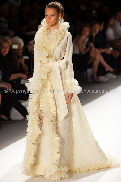 A model on the runway at the Zang Toi SS2013 show at New York Mercedes-Benz Fashion Week.