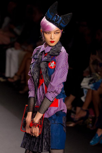 A model on the runway walking for the Anna Sui SS2013 show during Mercedes-Benz New York Fashion Week at the Lincoln Center in Manhattan, New York City.. Please email us to buy this image for online or print use of any nature for any length of time.